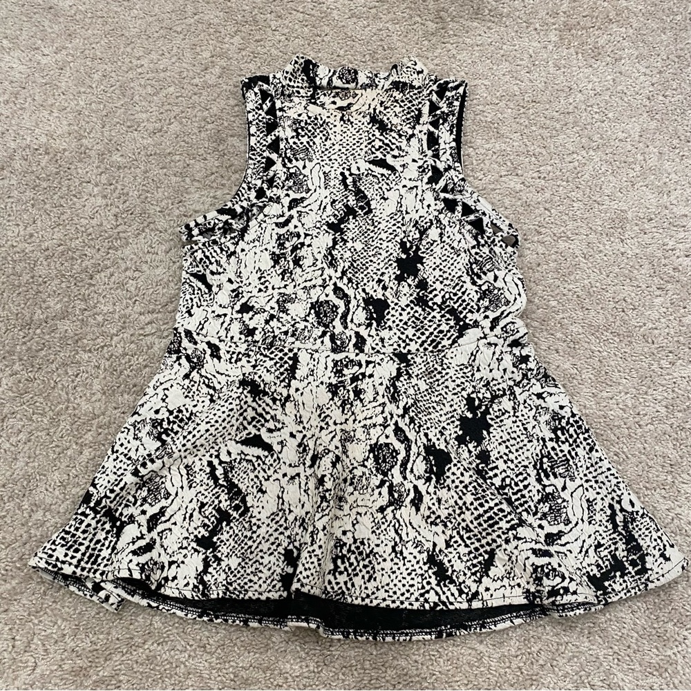 Free people black and white peplum tunic / top